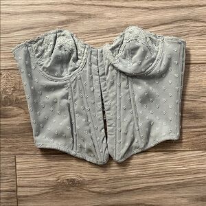 Out from under corset top